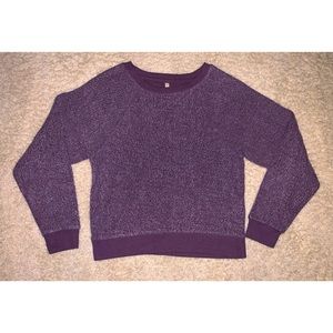 Purple, furry sweater